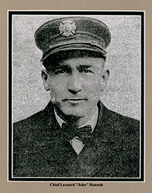 Historical photo of a man, John Hannah, in a fire chief uniform