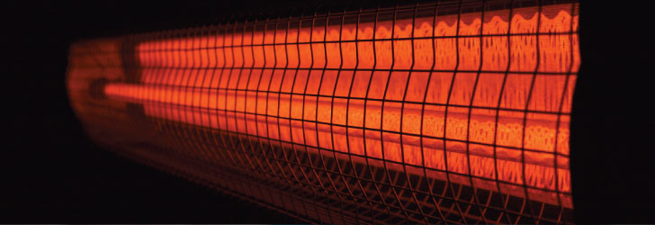 Close up view of a portable heater, glow red with heat